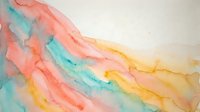 Abstract watercolor background with flowing coral pink turquoise and golden yellow brushstrokes creating organic waves and fluid movement for creative projects.