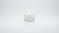 White square candle with a burning flame on a light reflective surface, soft glow and minimalist style for home decor and spa concepts.