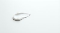 White cream or lotion smear isolated on white background, suitable for cosmetics, skincare, and beauty product packaging design.