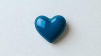 Glossy blue heart shape on white background with soft shadow, minimal romantic design element for valentines and love concepts.