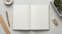 Open blank notebook with clean white pages surrounded by wooden ruler, golden pen, eraser and small succulent plant on neutral workspace for creative projects.