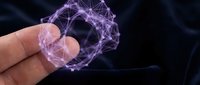 Hand holding glowing purple digital network sphere with connected nodes and lines representing technology, data visualization, and futuristic connectivity concepts.