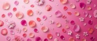 Romantic pink rose petals scattered on gradient background with delicate flowers for wedding, Valentine's Day, beauty and love themed designs.
