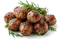 Juicy grilled meatballs garnished with fresh rosemary and herbs on white background, perfect for menu, restaurant promotion or cooking blog, close up food photography.