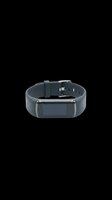Gray smart fitness tracker with silicone band, isolated on transparent background. Ready for t-shirt design, stickers, clipart, print on demand, and sublimation projects.