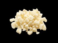 Diced white onion pieces isolated on transparent background, ready for culinary design, recipe graphics, food packaging, cooking blogs, restaurant menus, and print-on-demand products.