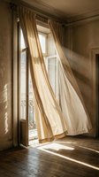 Sunlight streams through tall windows with flowing beige curtains in an elegant room with aged walls and wooden flooring, creating dramatic light and shadow patterns for interior design and home decor projects.