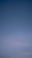 Smooth blue gradient sky background transitioning from deep navy to light purple hues for digital design and presentation projects.
