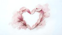 Delicate pink rose petals arranged in heart shape on white background for romantic wedding Valentine's Day greeting cards and love-themed designs.