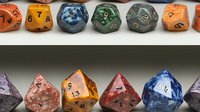 Colorful polyhedral dice arranged in rows showing various shapes and numbers, featuring metallic and marbled finishes on gaming pieces against neutral background.