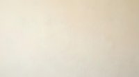 Soft beige textured paper background with subtle grain and natural fiber pattern for elegant design projects and creative layouts.