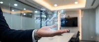 Businessman presenting holographic data analytics and growth charts in modern office conference room for corporate strategy meetings.