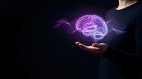 Glowing purple brain hologram floating above open palm against dark background representing artificial intelligence, neuroscience and mental health concepts.