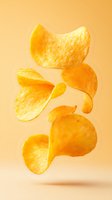 Crispy potato chips floating in air against orange background, showcasing golden texture and natural ridges. For food advertising and packaging design.