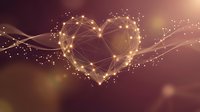 Golden heart-shaped network with glowing connections and particles on warm gradient background for romantic technology concepts.
