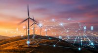 Wind turbines generating renewable energy with digital network connections at sunset showcasing smart grid technology and sustainable power infrastructure.