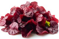 Dried cranberry slices isolated on white background, ready for food packaging, culinary design, snack marketing, and recipe illustration purposes.