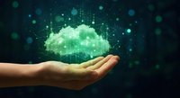 Human hand holding glowing green digital cloud with network connections and data particles on dark tech background for cloud computing concepts.