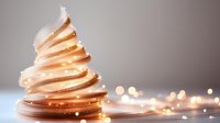 Magical glowing spiral light trail with golden sparkles and bokeh effects against soft gray background creates ethereal festive atmosphere.