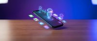 Modern smartphone with floating holographic app icons and digital interface elements on wooden surface with purple blue gradient background for technology concepts.