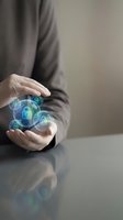 Person holding glowing digital security lock and padlock symbols in cupped hands, representing data protection, cybersecurity, and encrypted information technology solutions.
