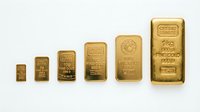 Gold bars of different sizes arranged in ascending order showing precious metal investment options for financial portfolio diversification.