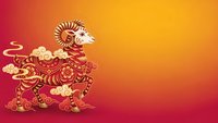 Golden ornate sheep with decorative patterns on vibrant red orange gradient background for Chinese New Year celebrations and traditional festival designs.
