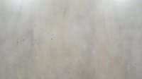 Natural beige concrete wall texture with subtle variations and organic patterns for modern interior design backgrounds and architectural projects.