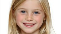 Young child with blonde hair and blue eyes smiling against white background, showcasing natural expression and healthy appearance for family, education, or healthcare concepts.