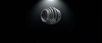 Metallic coil spring floating in dramatic dark studio lighting, showcasing industrial steel texture and sleek modern design for engineering and technology concepts.