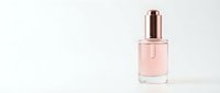Elegant pink perfume bottle with rose gold cap on clean white background for cosmetic and beauty product marketing campaigns.
