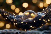 Magical glass sphere resting in dark feathers with glowing golden star lights and bokeh background, creating dreamy atmospheric composition for fantasy designs.