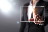 Businessman touching transparent digital screen with finger, futuristic technology interface for business presentations and digital innovation.