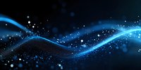 Glowing blue wave of particles flowing on dark background with light effects and bokeh, creating dynamic motion and energy visualization for technology designs.