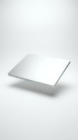 Sleek silver aluminum trackpad floating on white background, modern wireless input device with minimalist design for tech and productivity concepts.