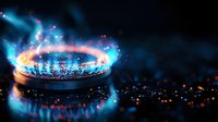 Gas stove blue flame with orange glow burning in dark kitchen, macro photography showing detailed heat pattern and energy consumption concept.