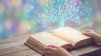 Open book on wooden table with glowing tree of knowledge illustration emerging from pages, hands reading, soft bokeh background with blue and purple light particles, education and learning concept.
