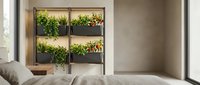 Modern vertical garden system with fresh herbs and plants in wooden frame for sustainable indoor living and home decor.
