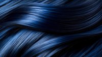 Luxurious dark blue hair strands with glossy shine and smooth texture flowing in elegant waves for beauty and haircare concepts.