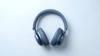 Blue wireless headphones isolated on white background, ready for audio equipment design, music technology, and consumer electronics projects.
