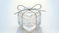 Crystal clear glass gift box with iridescent rainbow reflections tied with elegant silver ribbon bow on white background isolated for luxury packaging design.