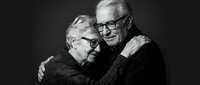 Senior Caucasian couple embracing warmly in black and white portrait showing love, connection and lasting relationship in golden years of marriage.
