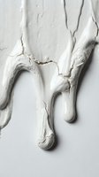 Dripping white paint with cracks and texture on neutral background, suitable for abstract art, design projects, and creative backgrounds.