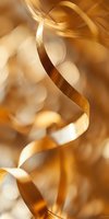 Twisted golden ribbon with warm bokeh background, flowing metallic strands creating elegant abstract composition for luxury design and festive decorations.