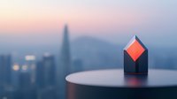 Small house model with glowing red light on round table against blurred urban skyline at dusk, creating minimalist architectural composition with bokeh city lights.