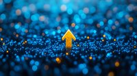 Glowing golden arrow pointing upward against dark background with blue bokeh lights and sparkles, symbolizing growth, success and forward momentum.