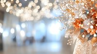 Dreamy bokeh lights and delicate floral elements create soft romantic atmosphere with blurred background in coral and blue tones, elegant wedding decor setting.
