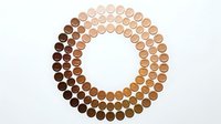 Circular arrangement of makeup foundation samples showing diverse skin tone spectrum from light to dark shades for cosmetic color matching and beauty industry.
