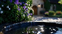 Stone water basin with floating white flowers surrounded by purple blooms in peaceful garden setting with soft natural lighting and blurred background.