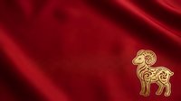 Luxurious deep red silk fabric with elegant golden ram symbol, perfect for festive designs, luxury branding, and holiday marketing materials.